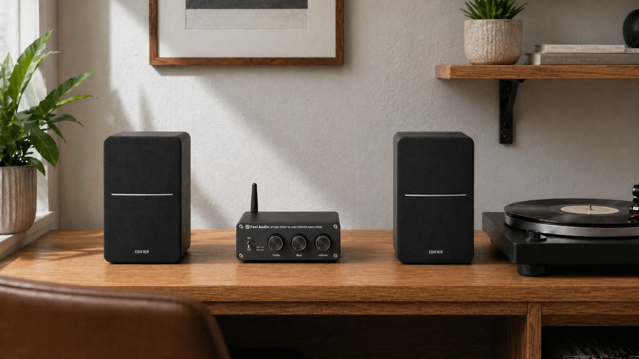 Fosi Audio BT20A compact amplifier with Edifier speakers on a simple desktop setup