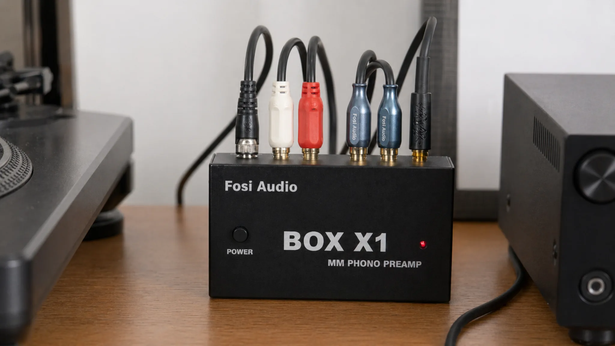 Fosi Audio Box X1 phono preamp with RCA cables properly connected between turntable and amplifier
