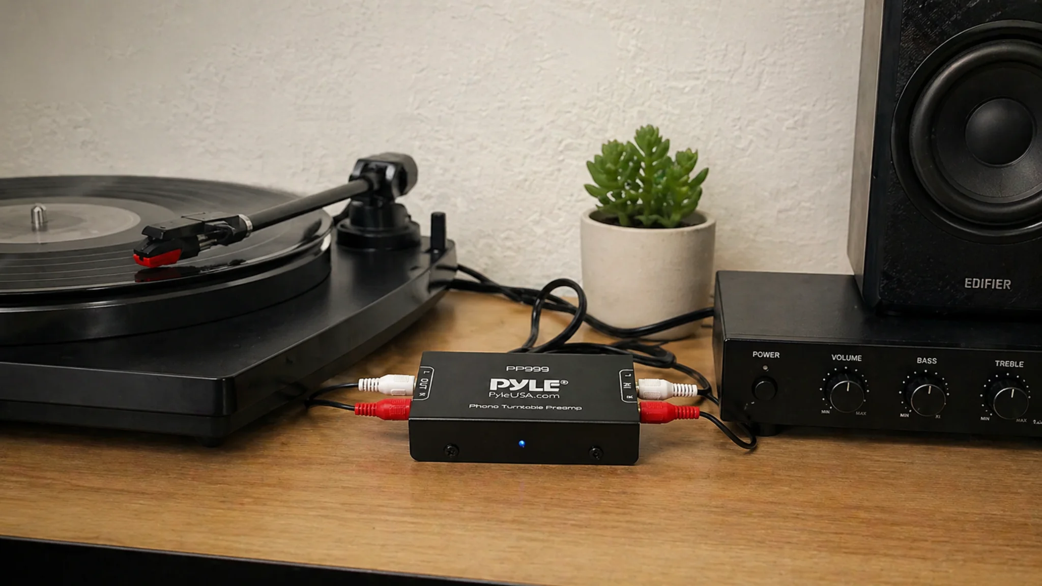 Pyle PP999 phono preamp in a basic vinyl setup with RCA cables connected to a turntable and amplifier