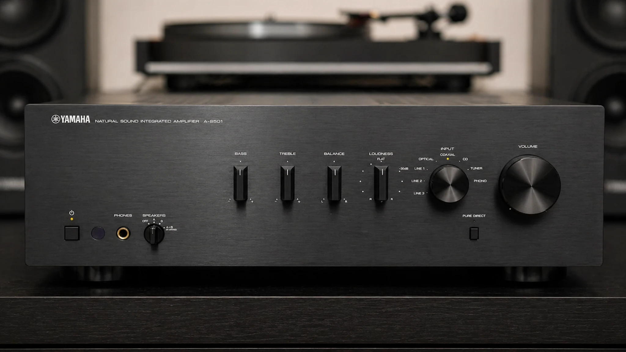 Yamaha A-S501 integrated amplifier front panel close-up showing brushed aluminum finish and control layout