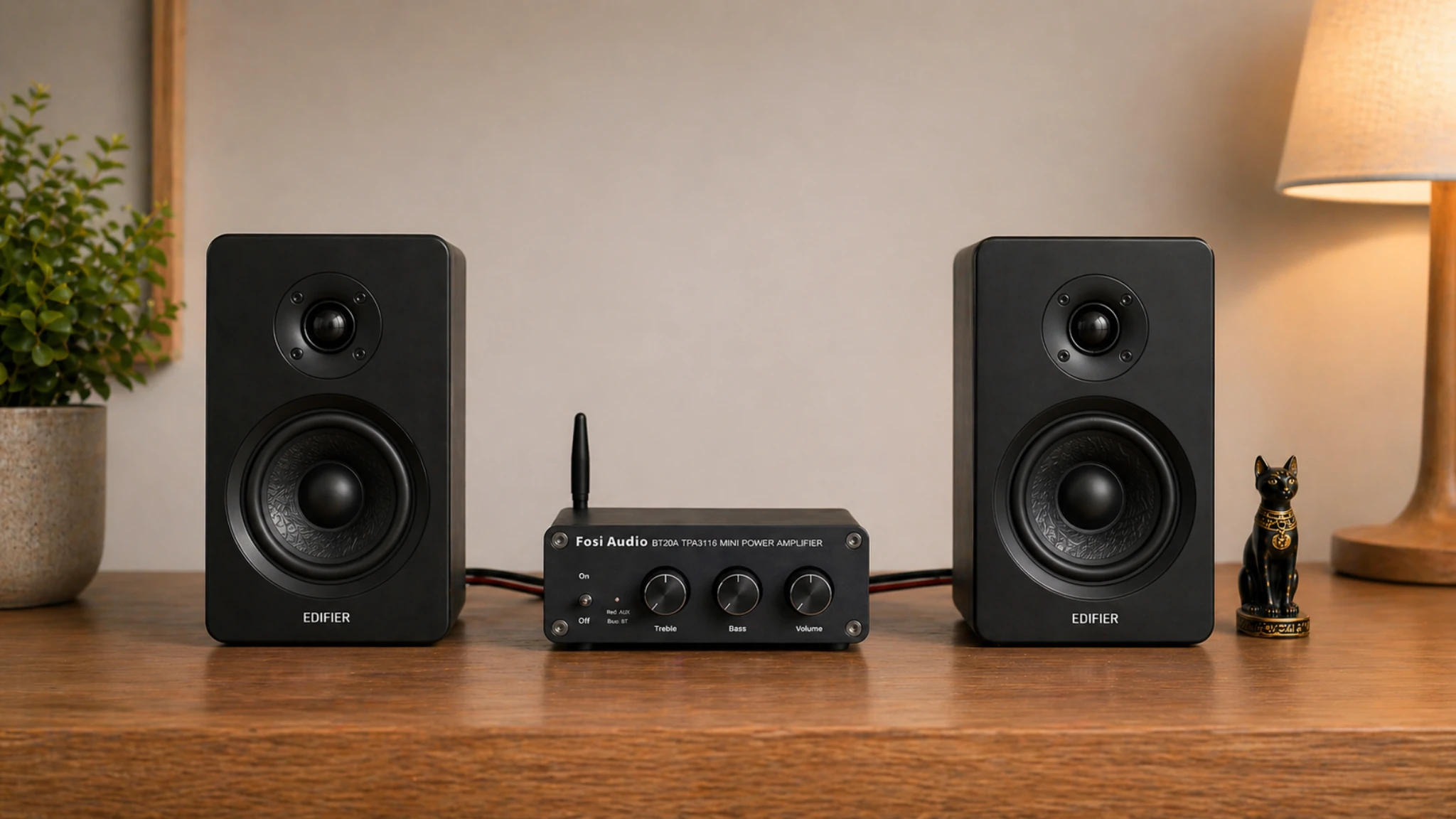 Fosi Audio BT20A mini power amplifier with dual speakers in a clean setup