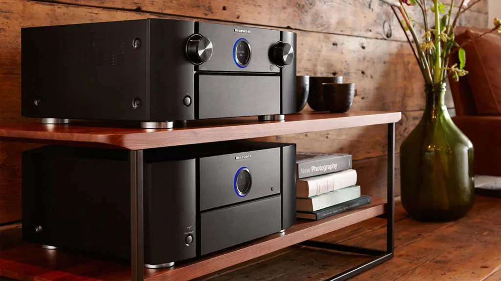modern stereo amplifier on wooden shelf in home audio setup