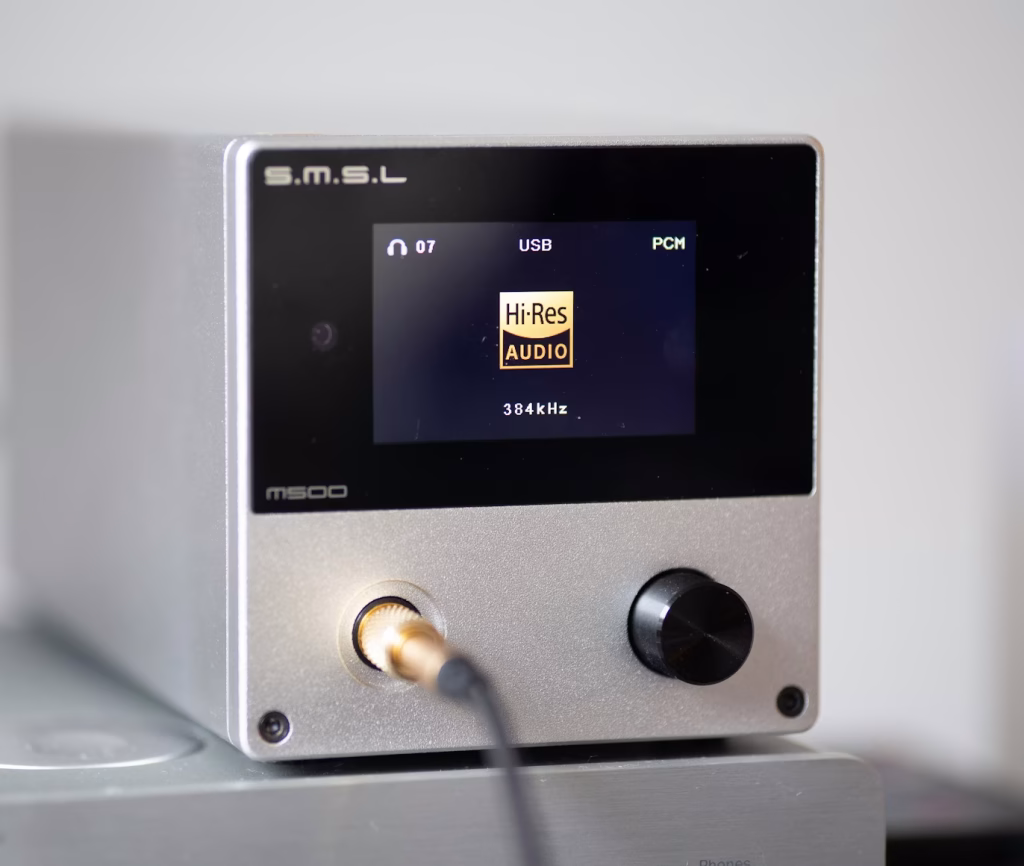 High-resolution desktop DAC with display showing Hi-Res Audio playback