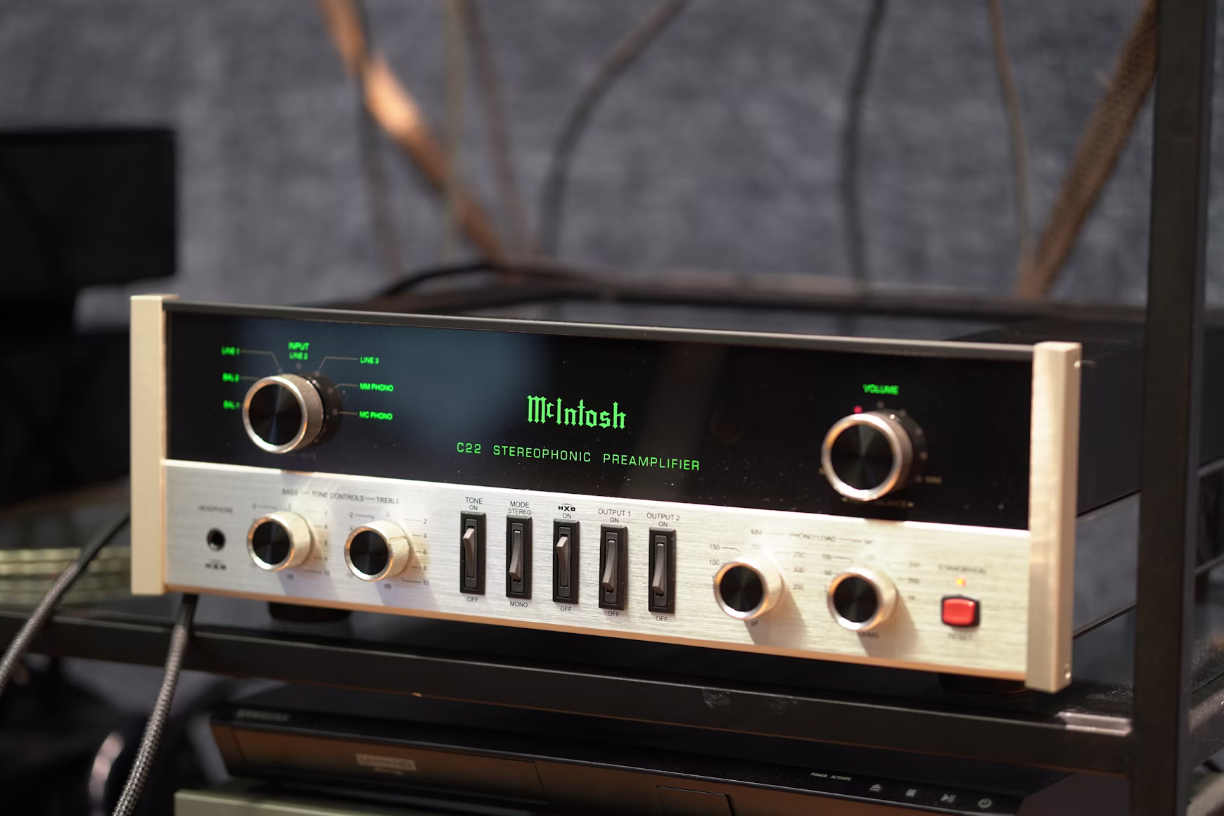 Vintage McIntosh stereophonic amplifier with phono controls on a Hi-Fi rack