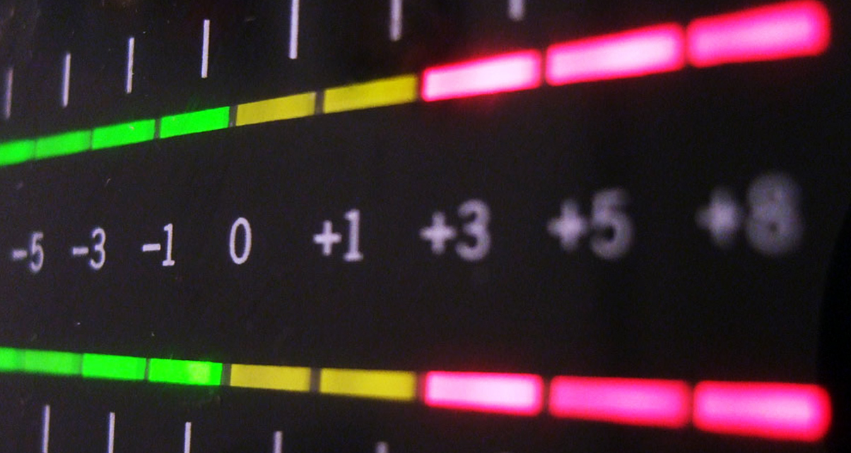 Audio level meter showing calibrated gain and volume reference points for amplifier tuning