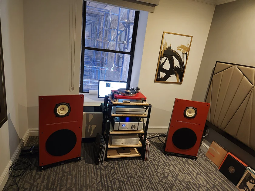 Simple home stereo system with amplifier and passive speakers in a living room
