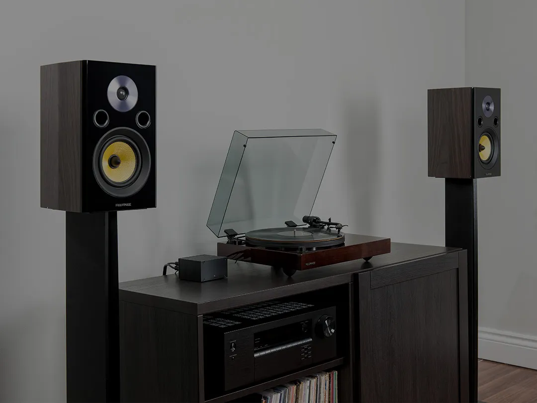 Powered speakers connected directly to a turntable in a simple home audio setup