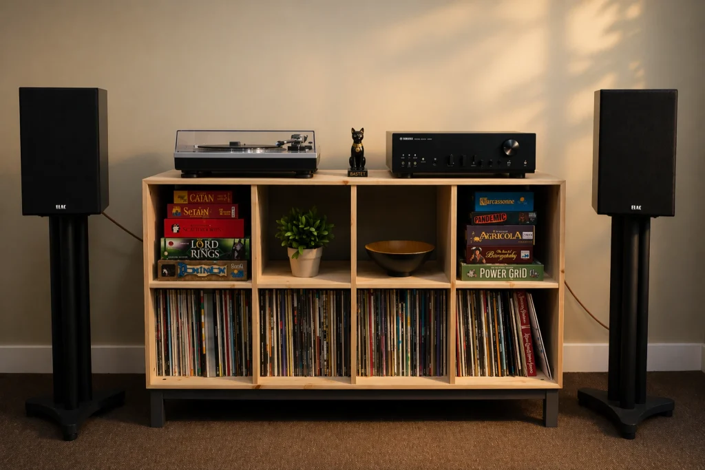 Compact stereo amplifier paired with bookshelf speakers in a balanced home audio setup